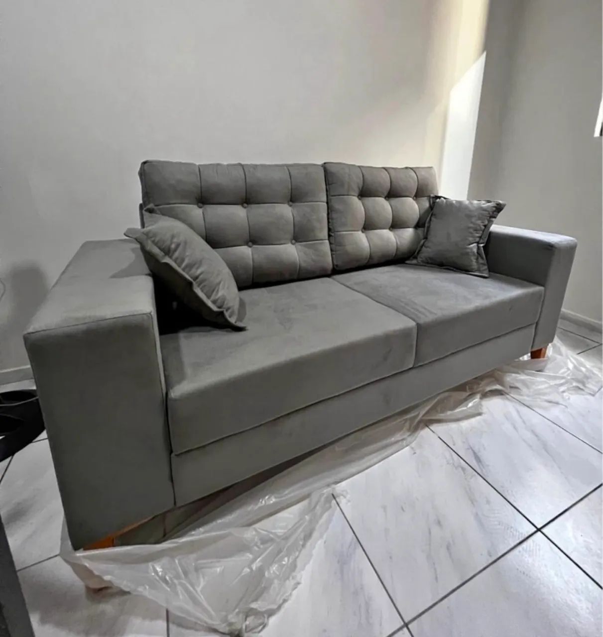 Brand-new sofas, factory-sealed and available