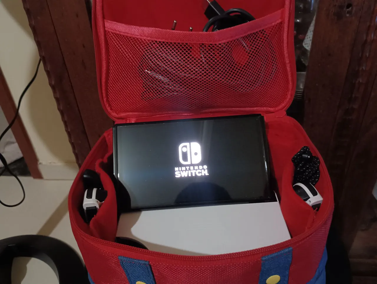 Kit Nintendo switch, bolsa de transporte e película