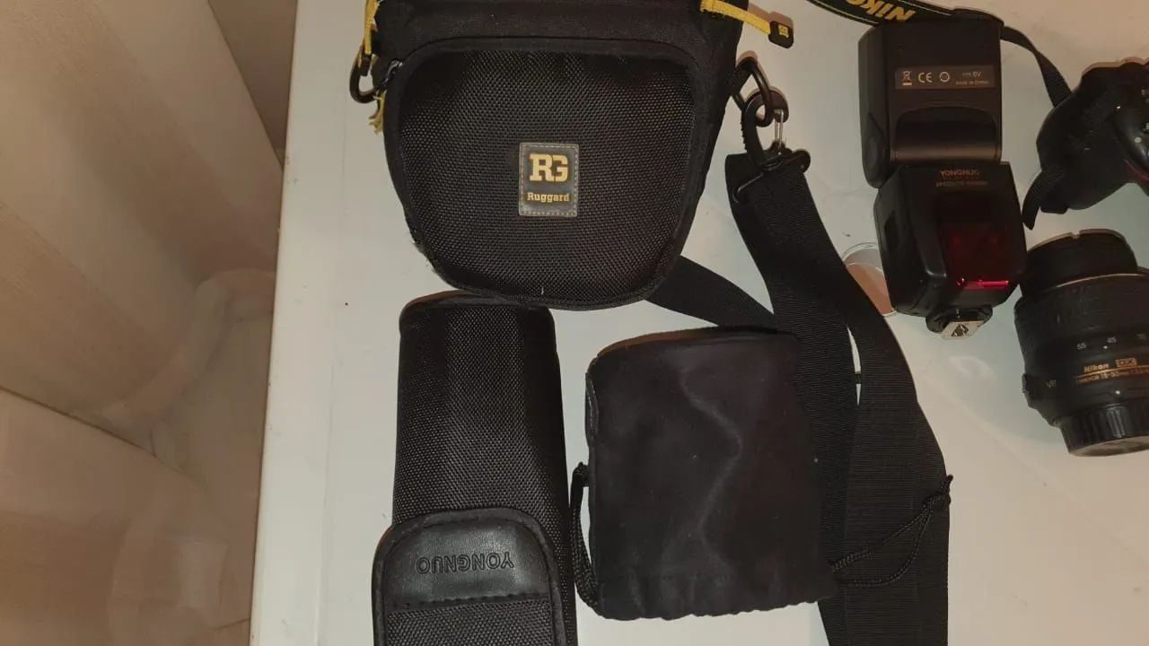 Nikon D5200 com 2 lentes, flash externo, bolsa e bateria extra. - Foto 2