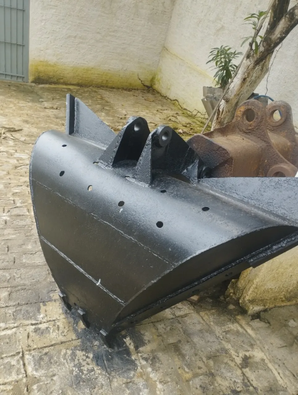 Concha trapezoidal retro escavadeira
