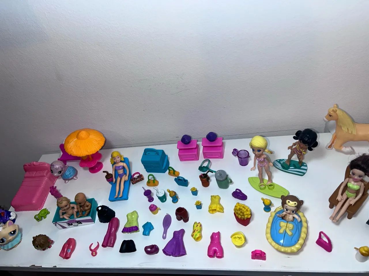 Kit de brinquedo da Polly com 62 peças  - Foto 6