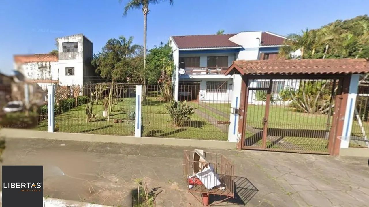 Casa com 3 dormitótrios, piscina e 2 vagas de garagem em Canoas. - Foto 2