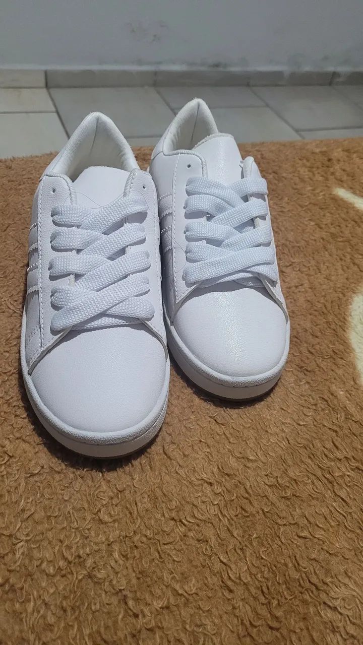 Tenis Novo