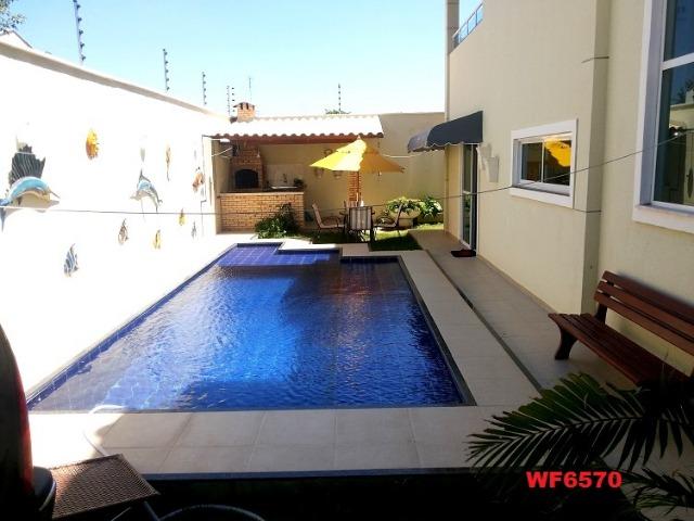 Casa duplex na Sapiranga, 4 suítes, projetada, piscina e deck individual, rua privativa - Foto 2