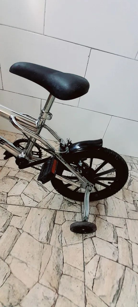 Bicicleta infantil aro 14  cromada - Foto 2