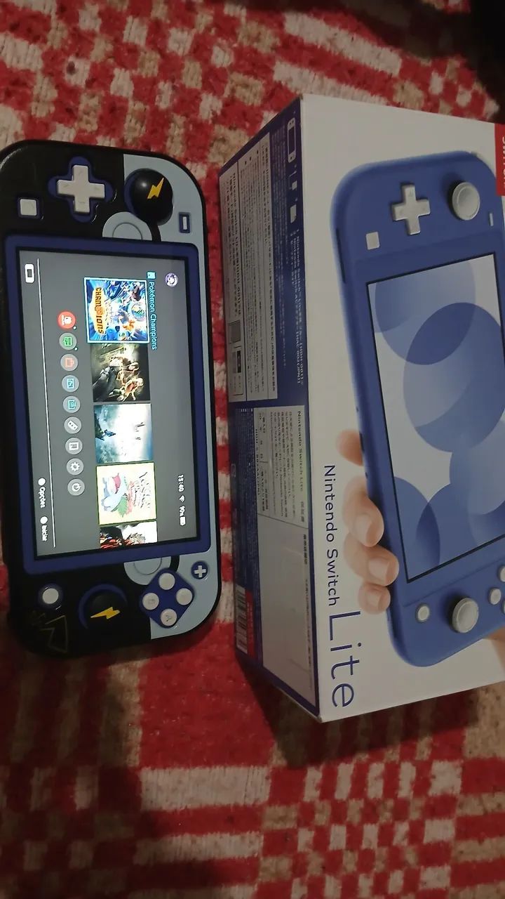Nintendo switch lite com caixa original e jogos - Foto 3