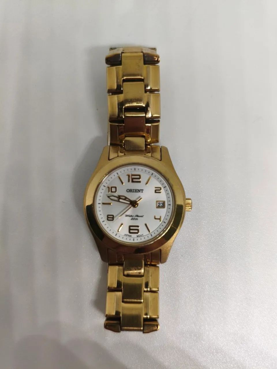 RELOGIO ORIENT FEMININO DOURADO MOSTRADOR BRANCO DATA ORIGINAL - TAM 16CM - Foto 2