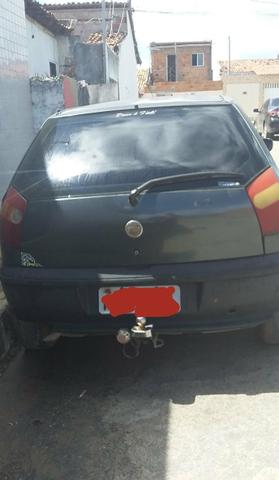 Vendo carro.palio 4 portas atrazado bom pra rodar no interior - Foto 3