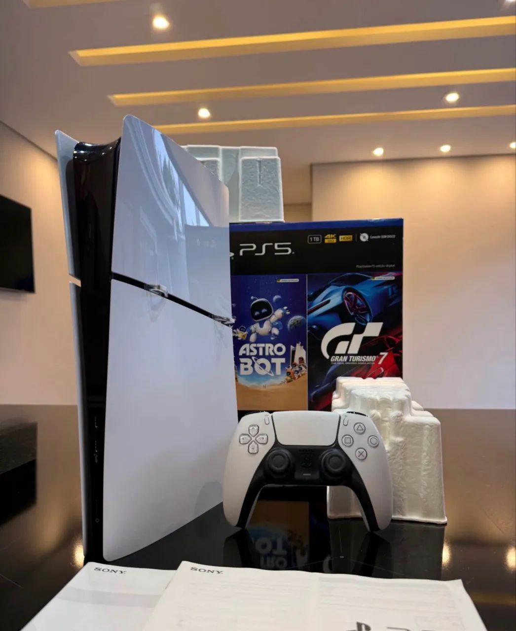 Ps5 slim 1tb c/ 3 jogos + caixa e nota 