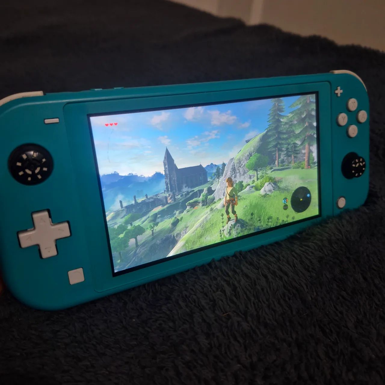 NINTENDO SWITCH LITE COM JOGOS ZELDA BOTW HADES BLASPHEMOUS BEM