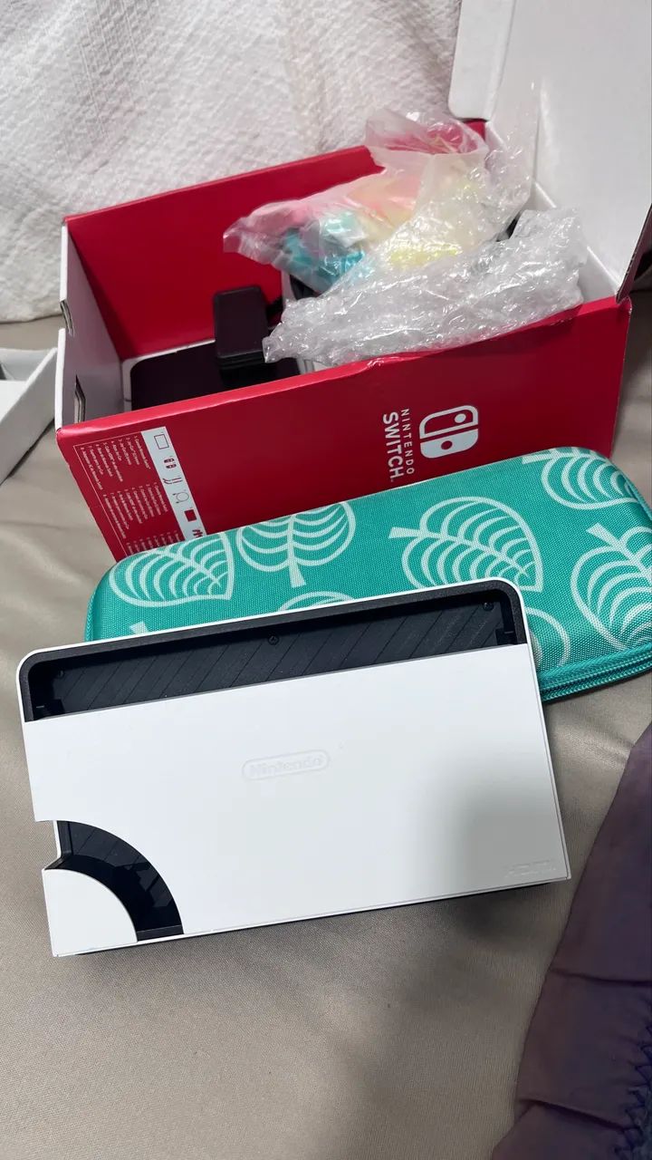 Nintendo Switch OLED impecável + caixa e acessórios - Foto 2