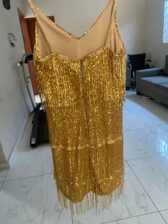 Macacão dourado com franja 