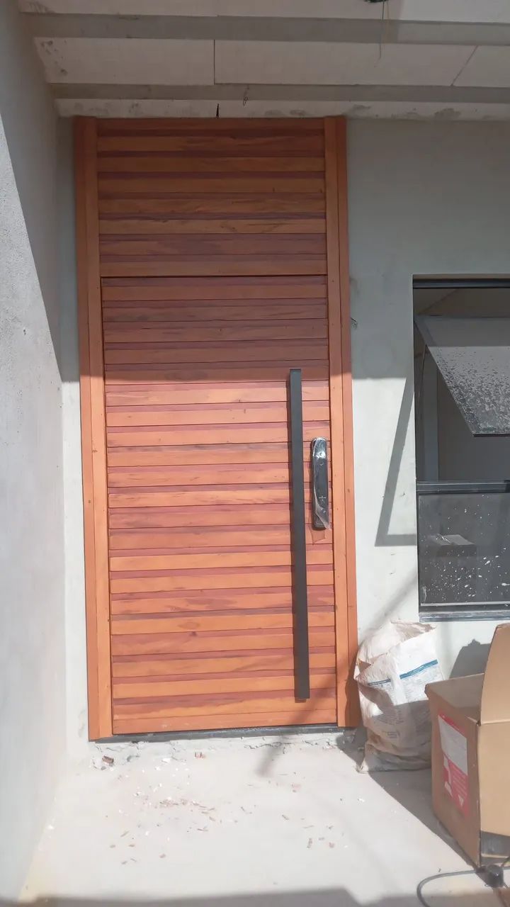Porta pivotante completa e instalada  no m²