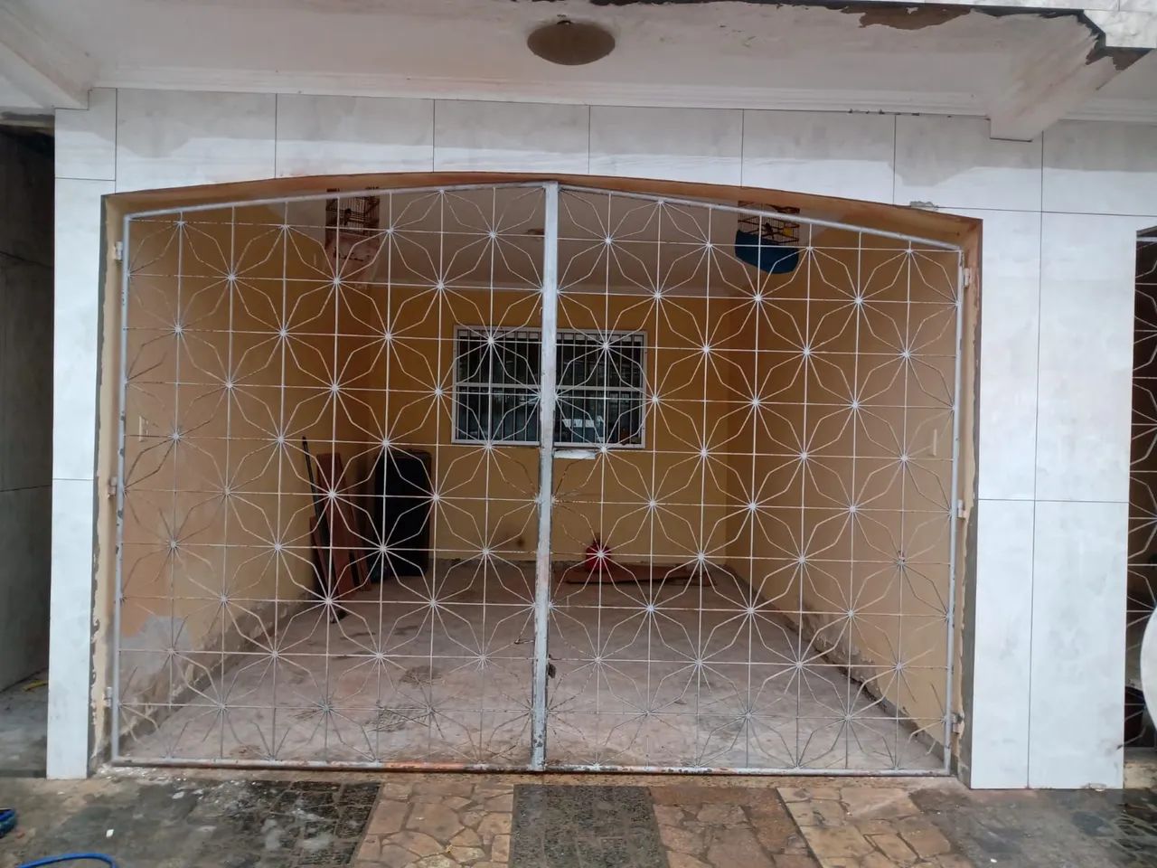 Vendo um portão 64842089693698120