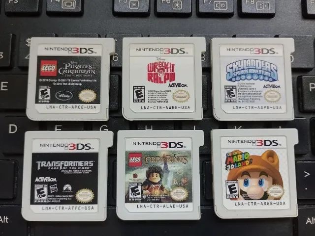 Lote 6 x Jogos Nintendo 3DS LEGO Piratas do Caribe, Transformers, LEGO Senhor dos Aneis - Foto 3