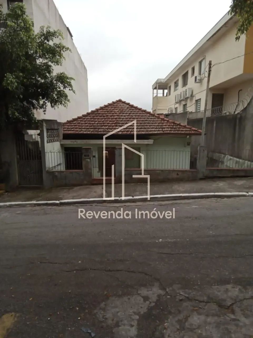 terreno com casas a venda
