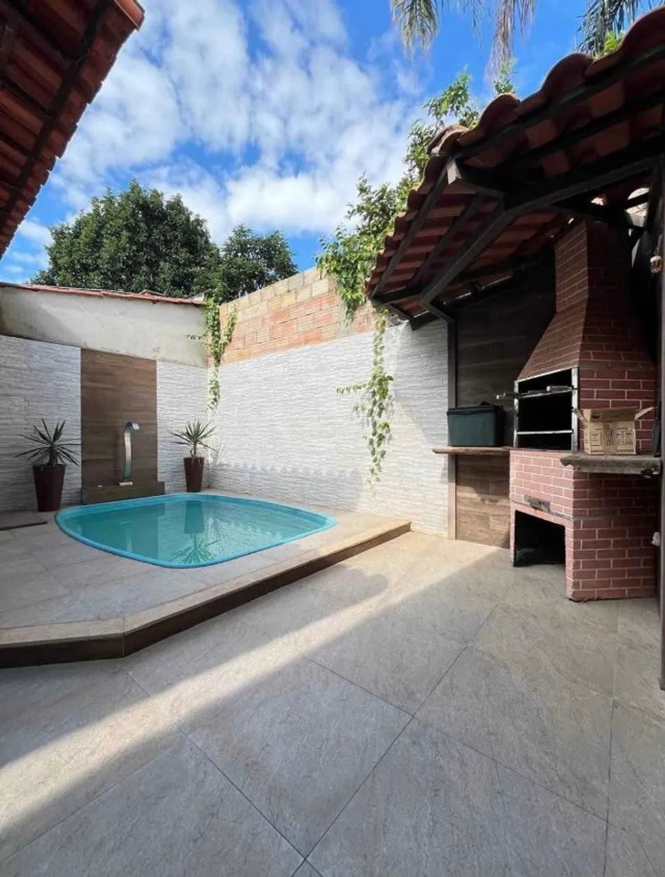 CASA EM NEOPOLIS COM 3 QUARTOS E PISCINA COM AREA GOURMET E CHURRASQUEIRA A VENDA - Foto 2