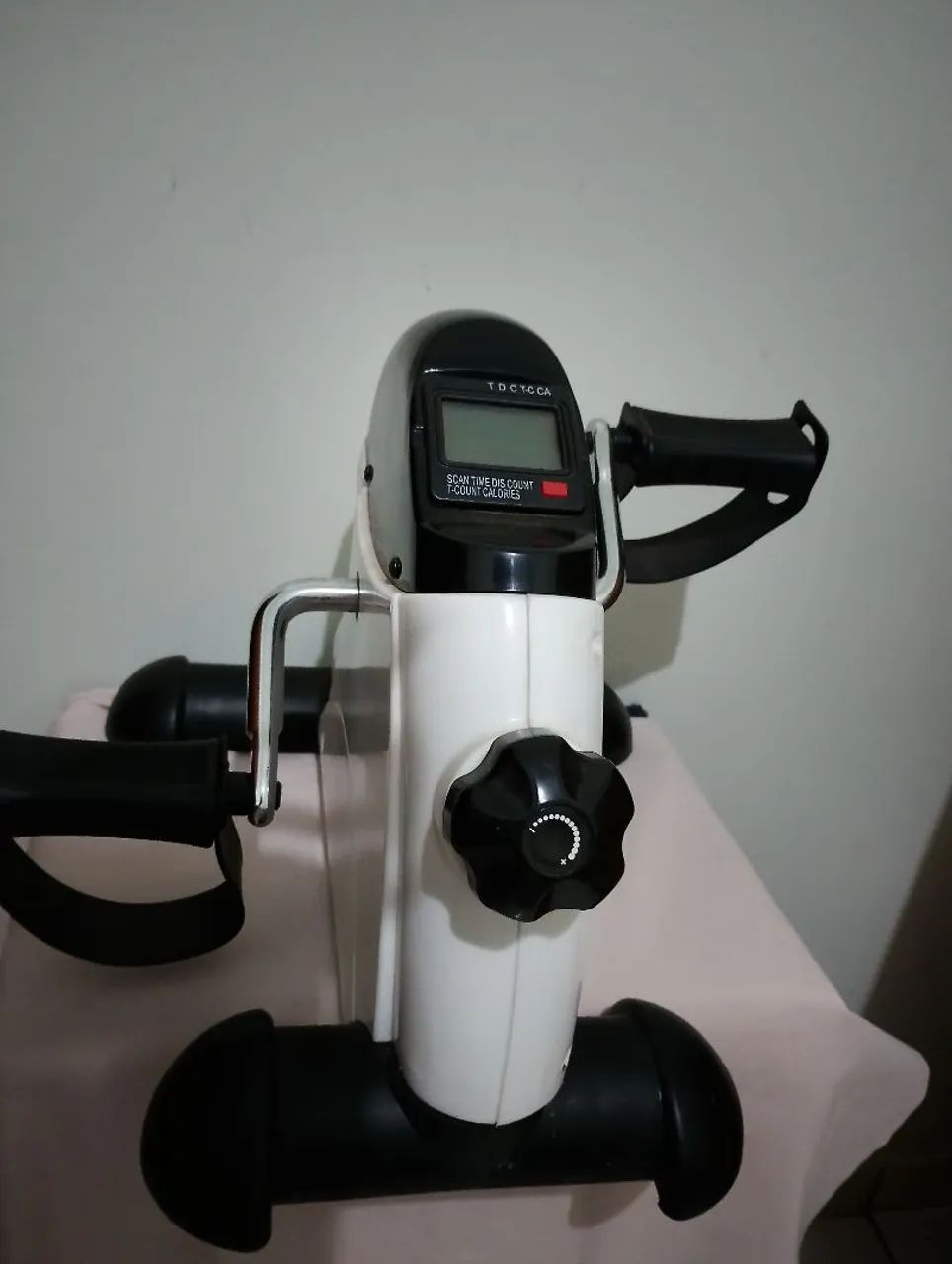 Massageador e bicicleta ergométrica 