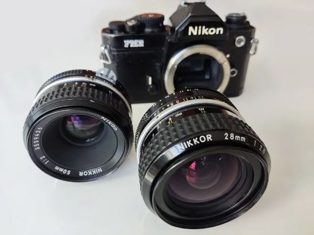 combo lentes Nikkor 50mm f/2 + Nikkor 28mm f/2.8 + estojo Lowepro + disparador remoto - Foto 4