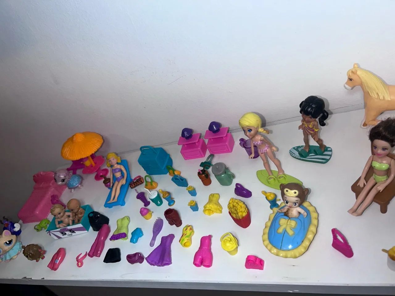 Kit de brinquedo da Polly com 62 peças  - Foto 4