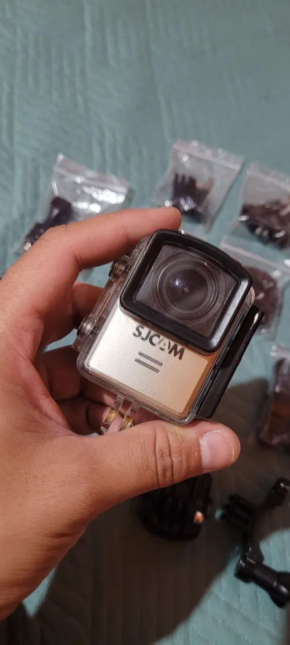 Câmera SJCAM Filma em 2k 60fps, acompanha cartão de memória, bateria extra e acessórios  - Foto 5