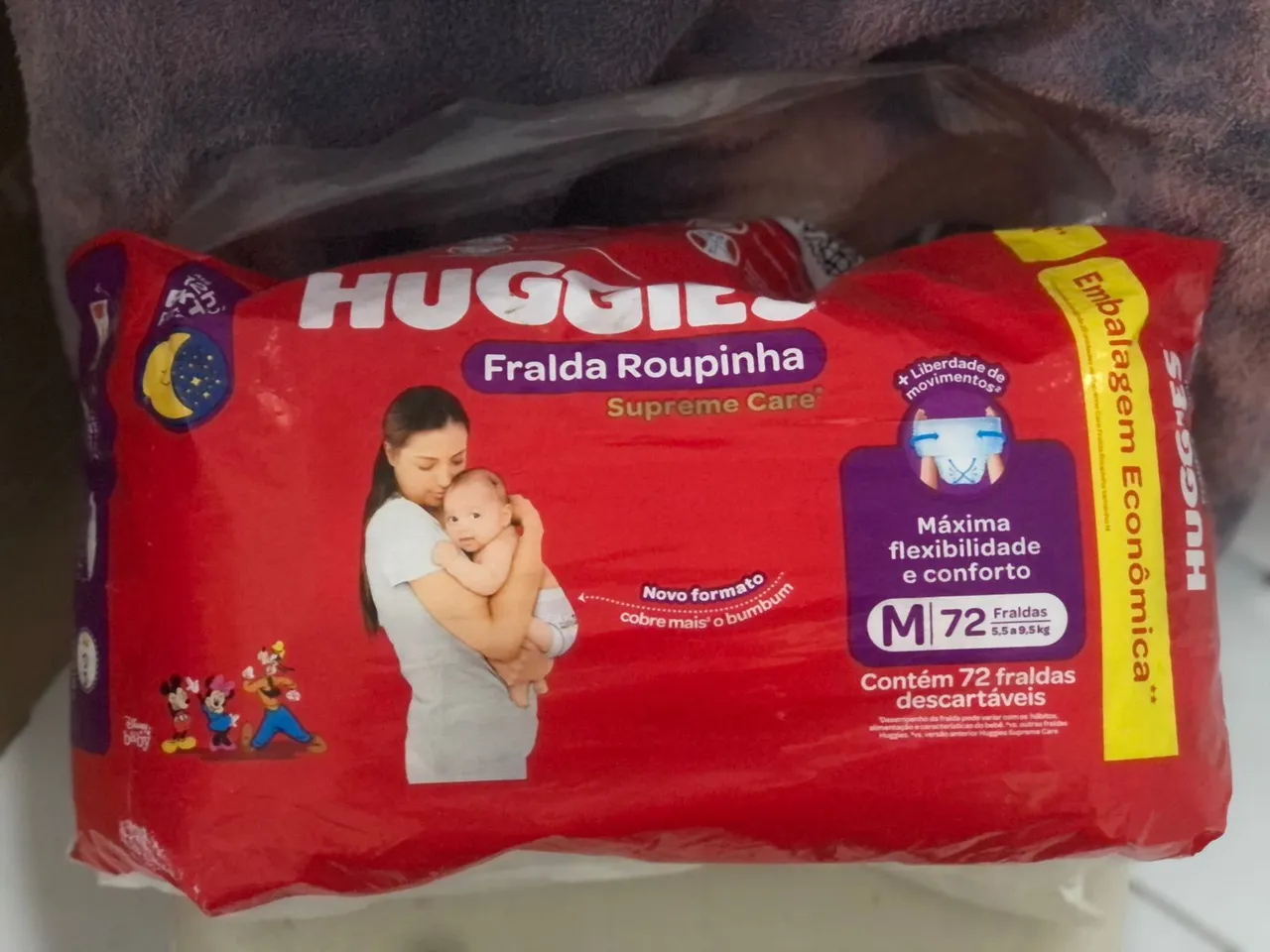 Fraldas Huggies Roupinha Supreme Care M72