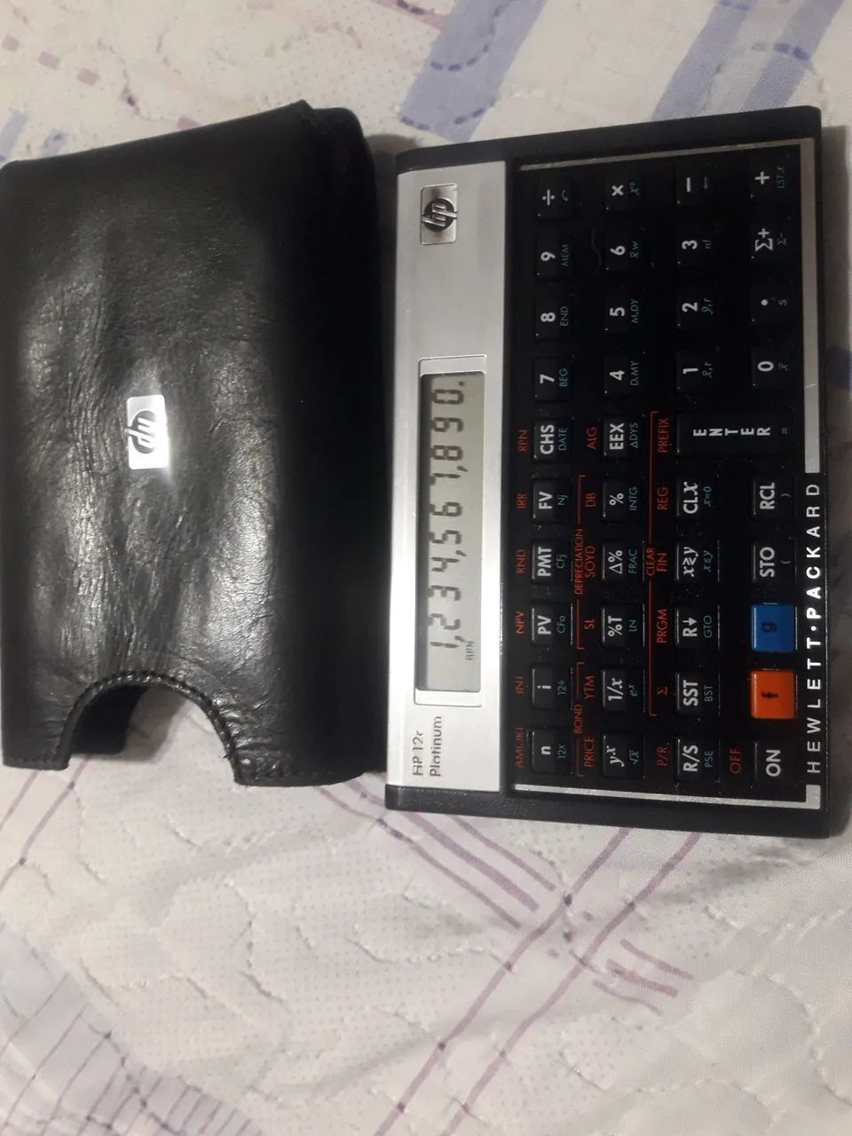 VENDO CALCULADORA HP-12C MODELO PLATINUM  C/CAPINHA