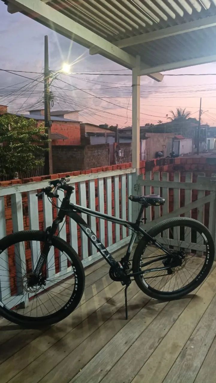 Vendo está bicicleta de comando completinha aro 29  - Foto 2