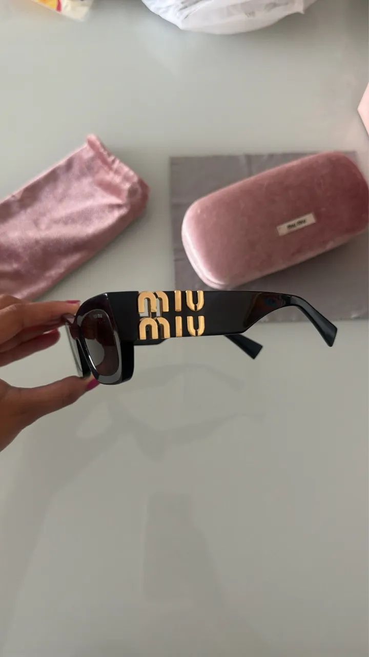 Óculos Miumiu 
