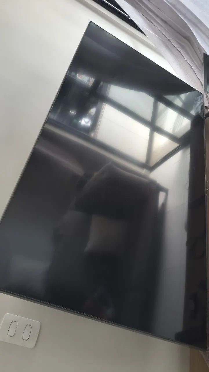 Televisão com defeito na tela