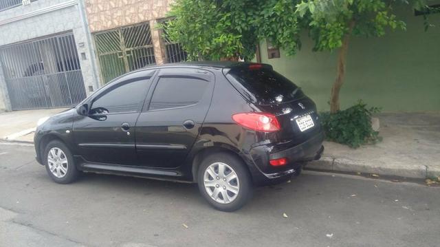 Peugeot 207 Flex ano 2010 completo - Foto 3