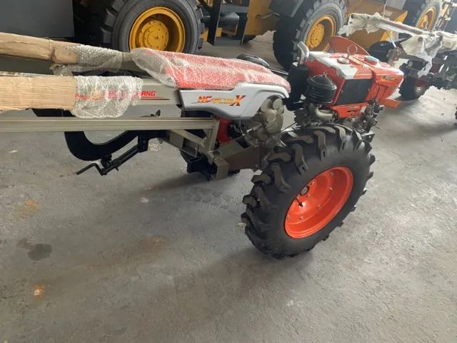 MICROTRATOR DE 14HP KUBOTA COM IMPLEMENTOS - Foto 4