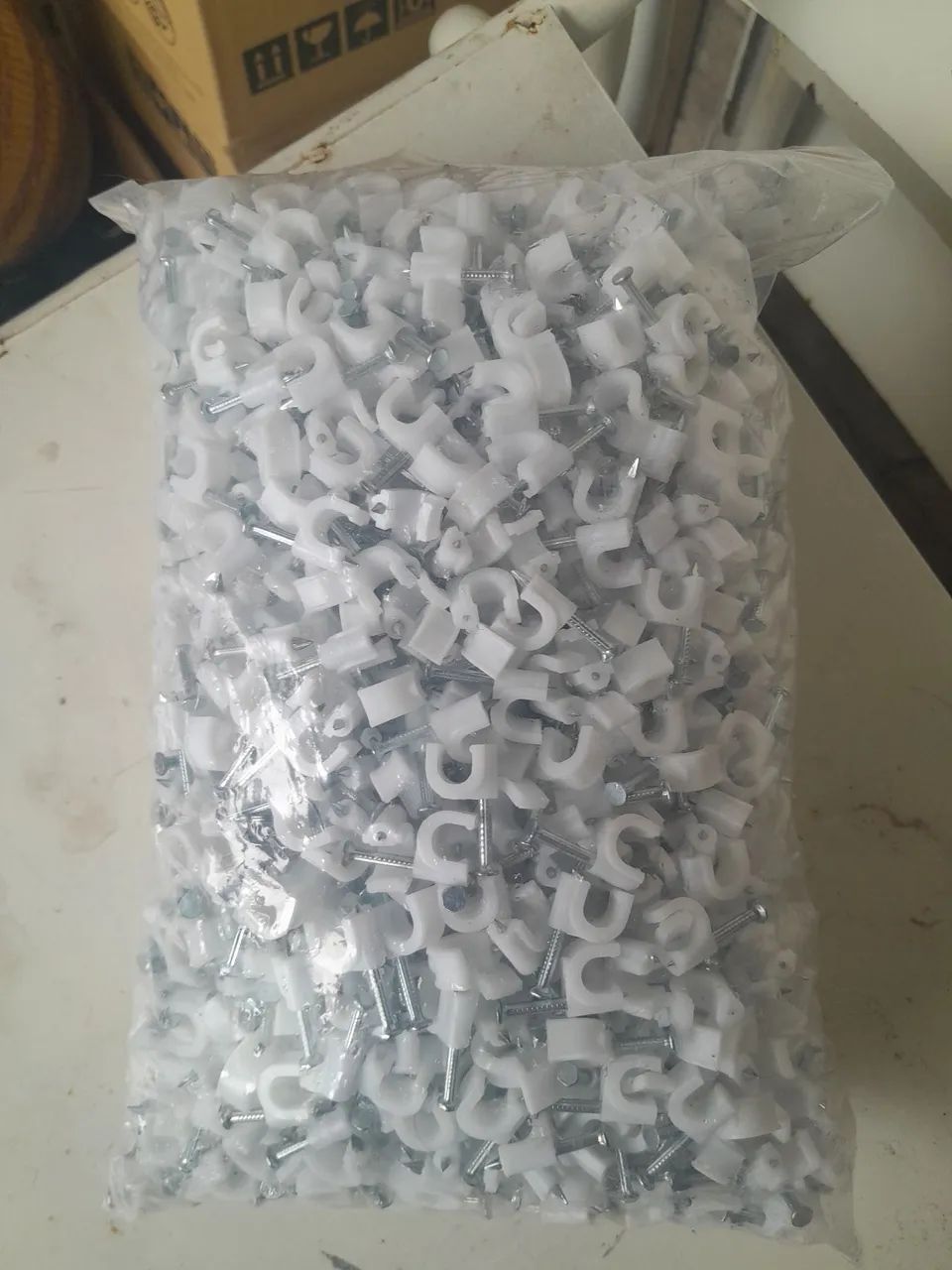 FIXA CABO COM PREGO DE AÇO