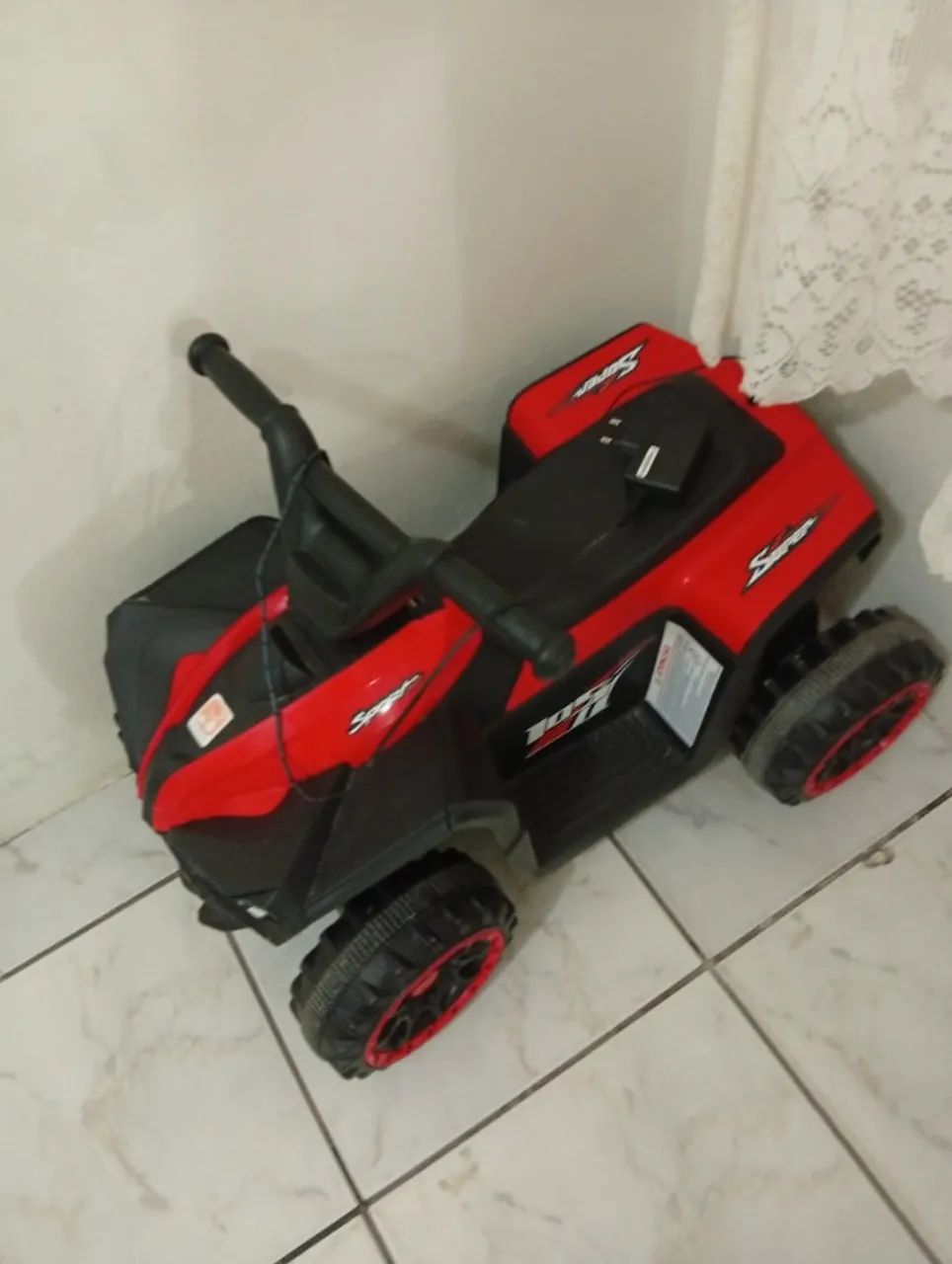 Quadriciclo elétrico infantil 
