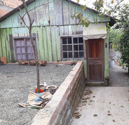 Troco terreno com casa em Nova Santa Rita por carro