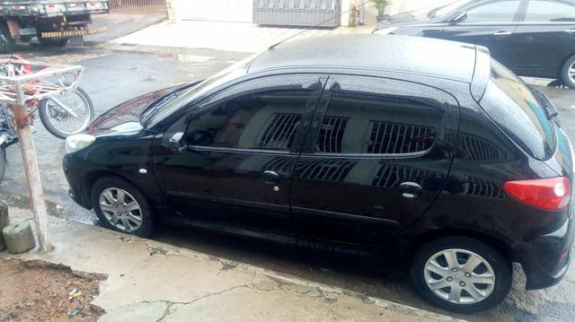 Peugeot 207 Flex ano 2010 completo