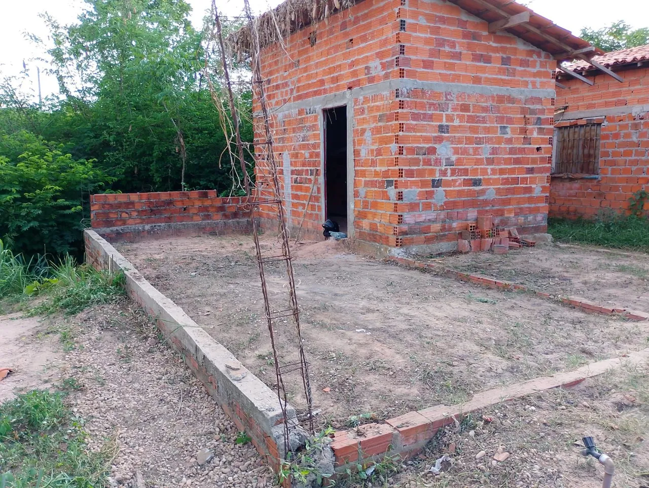 Casa com terreno