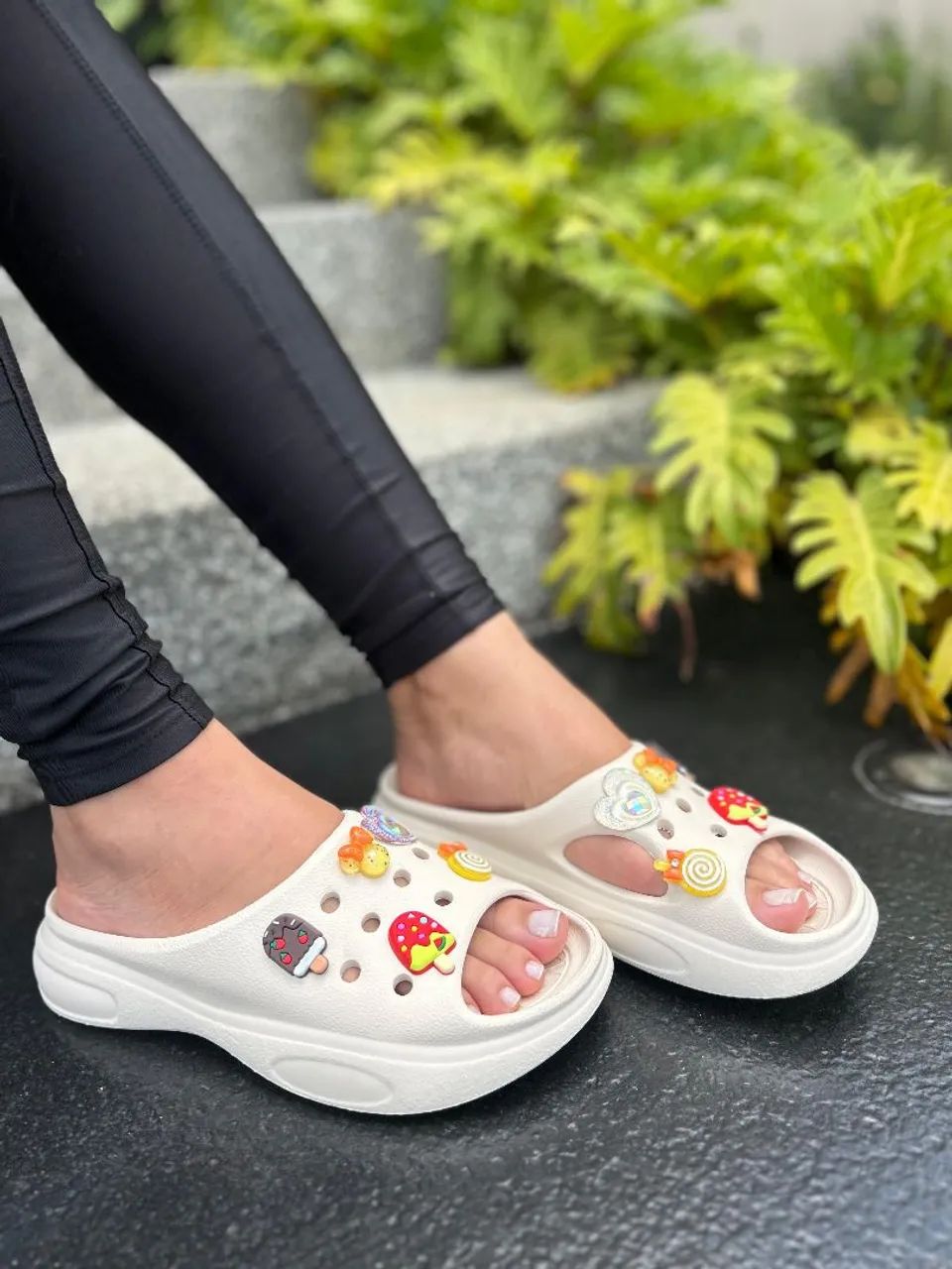 White sandal with charms for those who love novelties