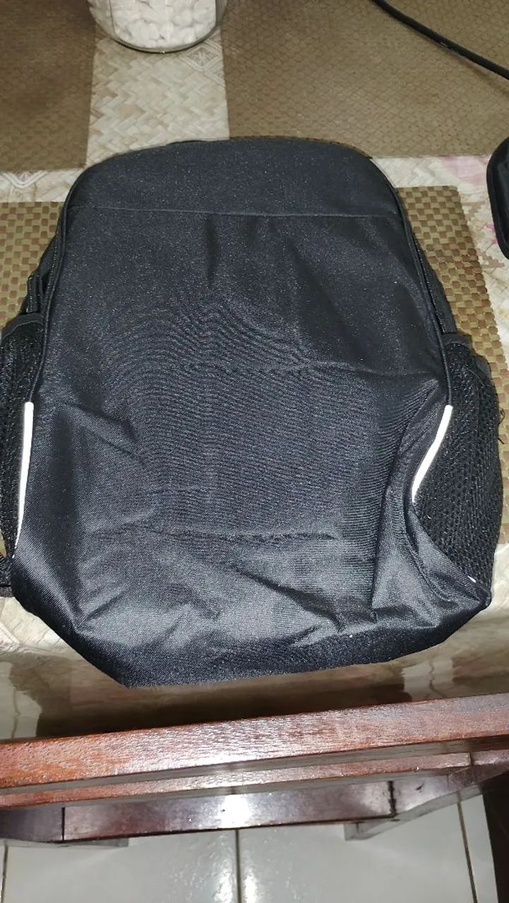 mochila nova poder cabe muita coisa até notebook 
