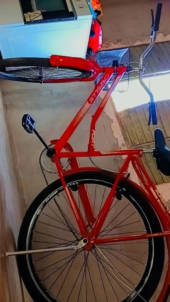 Vende se uma bicicleta seminovo com cadeirinha  - Foto 4