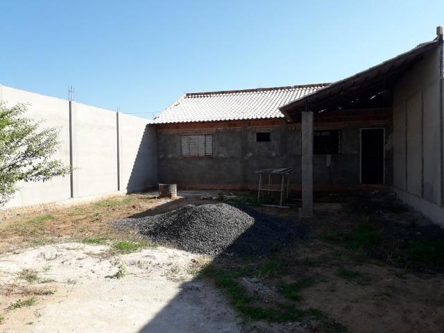 Casa em construçao ,terreno a pagar