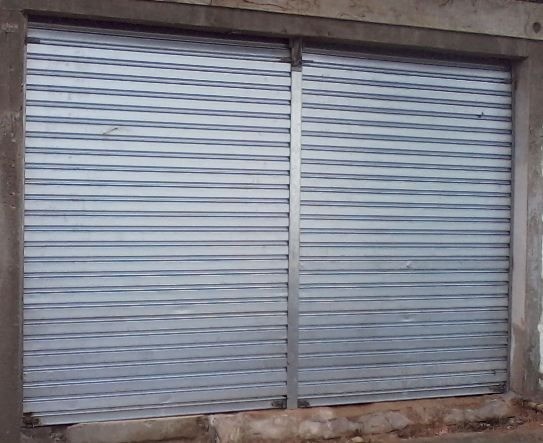 Portas de aço  de enrolar  manual ou automática reparação e fabricação - Foto 5