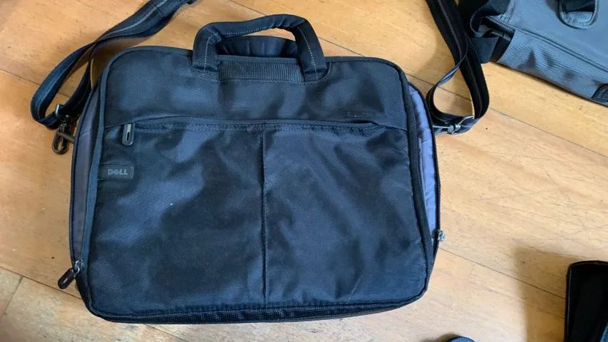 mala maleta bolsa dell ziper com defeito, desapegando!