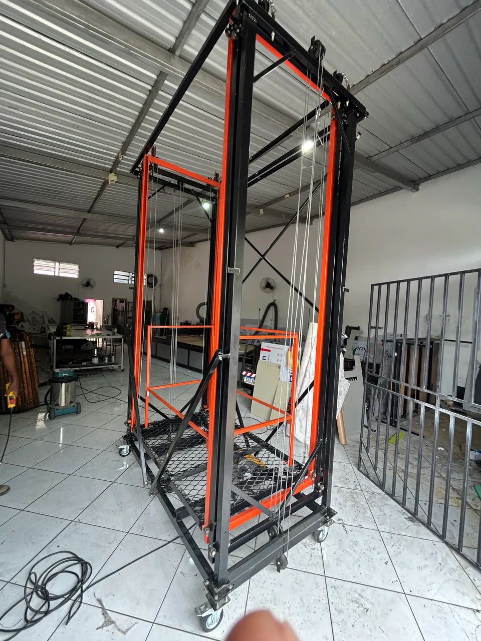 Plataforma Elevatória elétrica 9m 250 kg - Foto 6