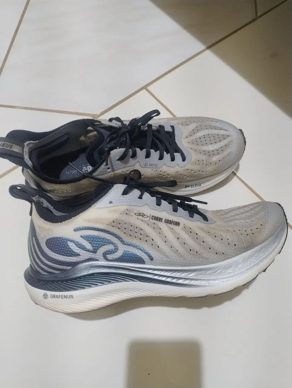 NIKE E OLYMPIKUS 
