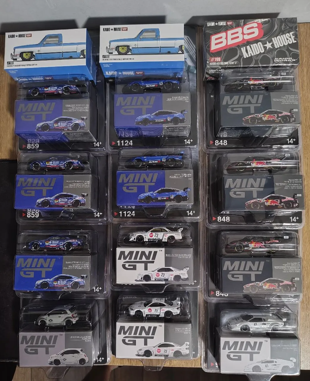 MINI GT 989 - Nissan Z VeilSide FFZ400 Laranja miniatura 1/64