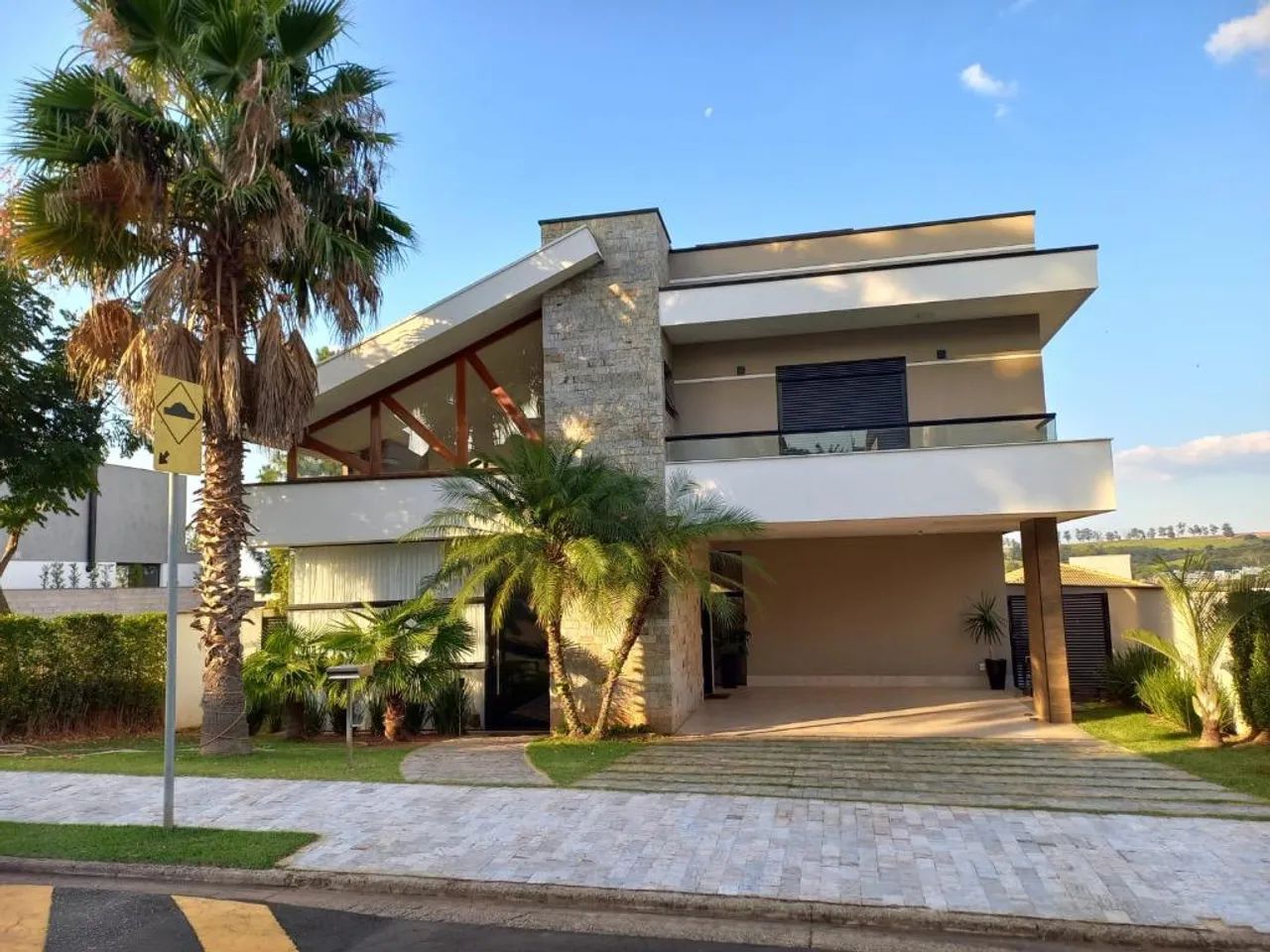 Sobrado para alugar em Campinas, Alphaville Dom Pedro, com 4 suítes, com 465 m² - Foto 2