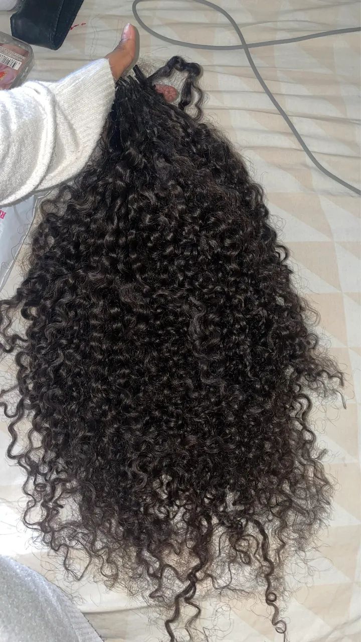 Selling 200 grams of curly human hair, 55 cm