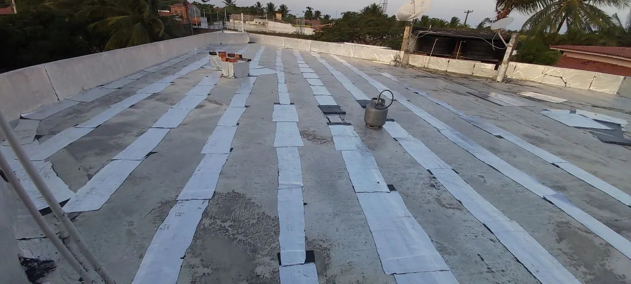 Aplicação de manta e retelhamento - Foto 3