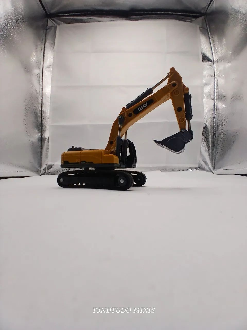 Miniatura de escavadeira